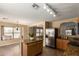 Kitchen featuring a center island, stainless steel appliances, and ample counter space at 252 S Canfield --, Mesa, AZ 85208
