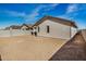 A large backyard with dirt landscaping and partial fencing is ready for personalization at 25308 N 133Rd Ave, Peoria, AZ 85383