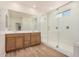 Bathroom with double sink vanity and glass shower at 25308 N 133Rd Ave, Peoria, AZ 85383