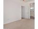 Neutral bedroom featuring adjacent bathroom entrance at 25308 N 133Rd Ave, Peoria, AZ 85383
