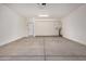 Spacious garage with clean concrete floors and plenty of room for parking and storage at 25308 N 133Rd Ave, Peoria, AZ 85383
