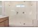 A large walk in shower with two shower heads at 25308 N 133Rd Ave, Peoria, AZ 85383