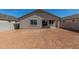 Spacious backyard featuring a block fence and view of the home's rear exterior at 25314 N 133Rd Ave, Peoria, AZ 85383