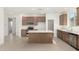 Well-equipped kitchen with stainless steel appliances and a central island at 25314 N 133Rd Ave, Peoria, AZ 85383