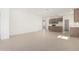 Bright open-concept space blending living and kitchen areas with tile flooring at 25314 N 133Rd Ave, Peoria, AZ 85383