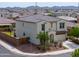 This spacious two-story home boasts of professional landscaping and a quiet neighborhood at 277 W Glacier Bay Dr, San Tan Valley, AZ 85140