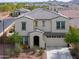 Beautifully landscaped two-story home with gray tiled roof and private driveway at 277 W Glacier Bay Dr, San Tan Valley, AZ 85140