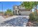 Beautiful two-story home with a two-car garage, desert landscaping, and inviting front entrance at 277 W Glacier Bay Dr, San Tan Valley, AZ 85140