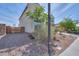 The property has a private side yard area with desert landscaping and block wall at 277 W Glacier Bay Dr, San Tan Valley, AZ 85140