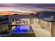 Contemporary home boasting a pool, outdoor patio, and desert mountain views at 29599 N 106Th Pl, Scottsdale, AZ 85262