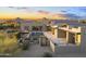 Contemporary home boasts a pool, patio, and mountain views at 29599 N 106Th Pl, Scottsdale, AZ 85262