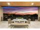 Outdoor dining set on a second story balcony with picturesque sunset views at 29599 N 106Th Pl, Scottsdale, AZ 85262