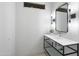 Bathroom featuring a floating vanity with modern fixtures and stylish lighting at 29599 N 106Th Pl, Scottsdale, AZ 85262