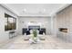 A spacious bedroom with natural light, seating area, and modern decor at 29599 N 106Th Pl, Scottsdale, AZ 85262