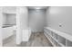 Neutral room with built-in shelving and tile floors at 29599 N 106Th Pl, Scottsdale, AZ 85262