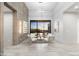 Inviting sitting area with contemporary decor, a decorative wall, and a view of the landscape at 29599 N 106Th Pl, Scottsdale, AZ 85262