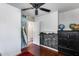 Bright bedroom with a chalkboard wall, hardwood floors, and a unique map wall design at 304 W 6Th St, Mesa, AZ 85201