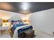 Cozy bedroom with a comfortable bed, soft lighting, and minimalist decor for relaxation at 304 W 6Th St, Mesa, AZ 85201