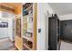 Hallway includes built-in shelves, decorative items, and a neutral color scheme creating a cozy space at 304 W 6Th St, Mesa, AZ 85201
