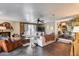 Comfortable living room with a fireplace and open access to a dining area at 304 W 6Th St, Mesa, AZ 85201