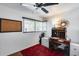 Bright home office with natural light, a vintage desk, and a cozy rug, perfect for productivity at 304 W 6Th St, Mesa, AZ 85201