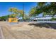 Stadium entrance with the Athletics logo and trees on a sunny day at 304 W 6Th St, Mesa, AZ 85201