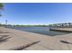 Scenic waterfront view with calm water and palm trees in the background at 304 W 6Th St, Mesa, AZ 85201