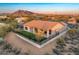 Charming backyard with artificial turf, covered patio, fully fenced, and mountain views at 32806 N 55Th Pl, Cave Creek, AZ 85331