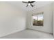 Bedroom featuring neutral decor and a window showcasing desert views at 32806 N 55Th Pl, Cave Creek, AZ 85331
