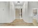 Clean, bright entrance with hardwood style floors leading to front door at 32806 N 55Th Pl, Cave Creek, AZ 85331