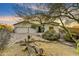 Single-story home featuring desert landscaping and a three-car garage at 32806 N 55Th Pl, Cave Creek, AZ 85331