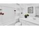 Clean, bright bathroom featuring a shower-tub combo and modern vanity at 3309 E Malibu Dr, San Tan Valley, AZ 85143