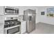 Well-equipped kitchen featuring stainless steel appliances and plenty of cabinet space at 3309 E Malibu Dr, San Tan Valley, AZ 85143