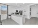 Bright kitchen featuring white cabinets, stainless steel appliances, and a center island at 3309 E Malibu Dr, San Tan Valley, AZ 85143