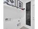 Clean laundry area with practical shelving and modern design elements at 3309 E Malibu Dr, San Tan Valley, AZ 85143