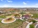 Community aerial view of the neighborhood playgrounds with covered seating areas at 3347 E Malibu Dr, San Tan Valley, AZ 85143