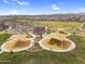 Aerial view of community playground, picnic areas and surrounding neighborhood at 3347 E Malibu Dr, San Tan Valley, AZ 85143