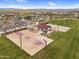 Aerial view of the neighborhood featuring basketball and volleyball courts, picnic areas and pool at 3347 E Malibu Dr, San Tan Valley, AZ 85143