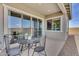 The outdoor patio has dining seating and overlooks the backyard and offers an additional living and entertaining space at 3347 E Malibu Dr, San Tan Valley, AZ 85143