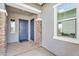 Welcoming front entrance featuring double doors, stylish brick columns, and a 'Welcome Home' door mat at 3347 E Malibu Dr, San Tan Valley, AZ 85143