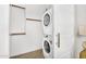 The laundry area is in the closet next to a stacked washer and dryer for space saving convenience at 3347 E Malibu Dr, San Tan Valley, AZ 85143