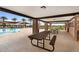 Relaxing poolside pavilion with picnic tables and stone accent columns at 3347 E Malibu Dr, San Tan Valley, AZ 85143