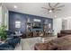 Inviting living room with a board and batten accent wall and comfortable seating at 3522 E Penedes Dr, Gilbert, AZ 85298