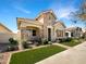 Charming front exterior with stone accents, green lawn, and inviting walkway at 4171 E Ronald St, Gilbert, AZ 85295