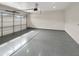 Spacious two car garage with sealed concrete floors and overhead door at 4171 E Ronald St, Gilbert, AZ 85295