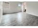 Spacious living room featuring durable tile flooring and large window at 4171 E Ronald St, Gilbert, AZ 85295