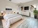 Serene main bedroom featuring a comfortable bed, stylish decor, and a bright window view at 4171 E Ronald St, Gilbert, AZ 85295
