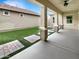 Covered patio with ceiling fan, decorative columns and view of backyard at 4171 E Ronald St, Gilbert, AZ 85295