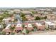 Aerial view showcasing homes with red tile roofs and well-maintained landscaping in a suburban neighborhood at 4436 E Shomi St, Phoenix, AZ 85044