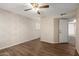 Comfortable bedroom features hardwood floors and neutral wall color at 4436 E Shomi St, Phoenix, AZ 85044